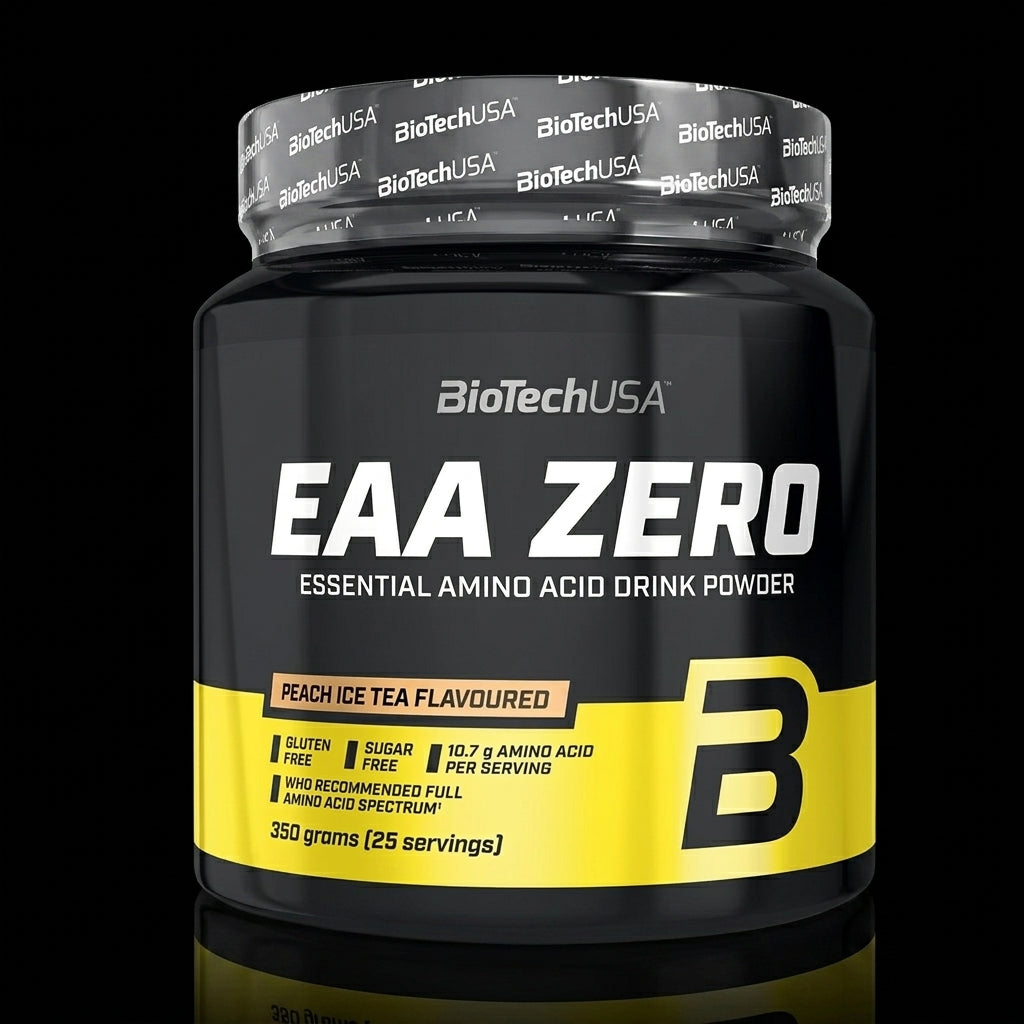BioTechUSA EAA Zero Essential Amino Acid Drink Powder in a black plastic tub with a yellow and white label, shown on a reflective black background.